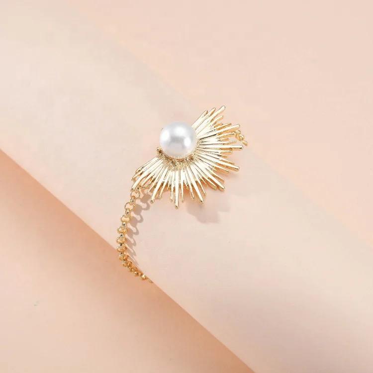 Pearl Embedded Gold Half Sun